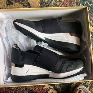 Micheal Kors women’s athlete shoes